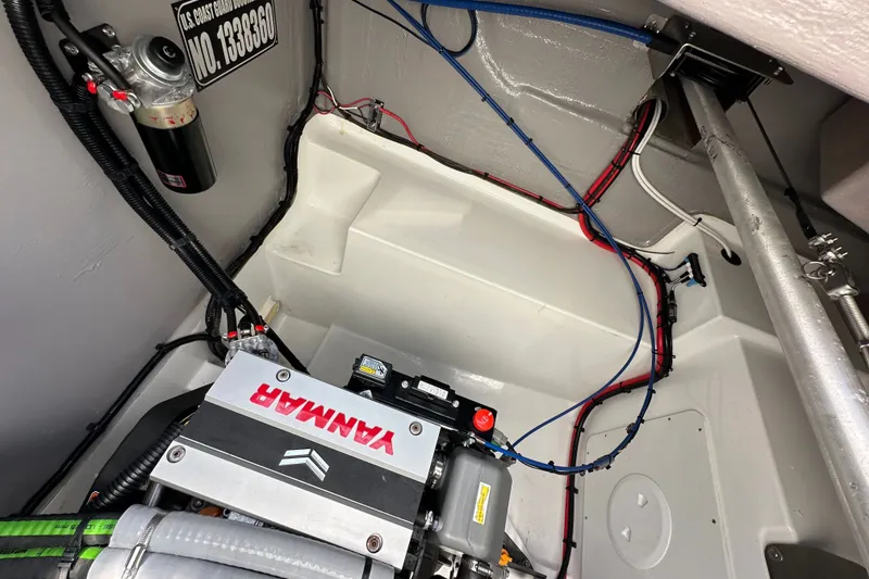 Slide: The Image of Engine compartment of a 2023 Bali 4.4 boat with Yanmar engine and wiring. - 113