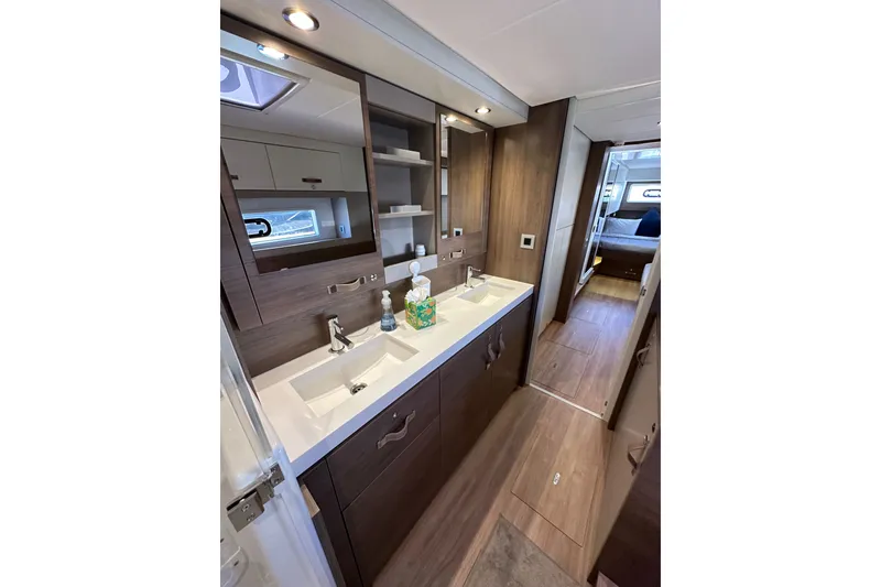 Slide: The Image of Luxurious bathroom interior of 2023 Bali 4.4 yacht with dual sinks and modern fixtures. - 83