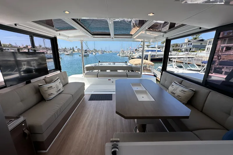 Slide: The Image of Luxurious interior of 2023 Bali 4.4 yacht with spacious seating and marina view. - 102