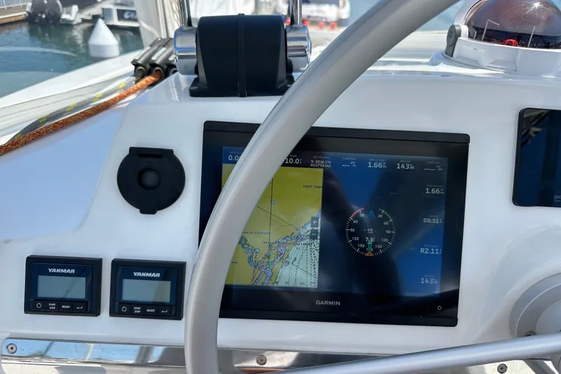 Slide: The Image of Boat cockpit with Garmin navigation display on a 2023 Bali 4.4 model. - 38