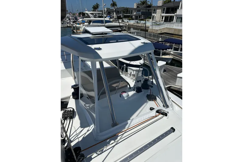 Slide: The Image of 2023 Bali 4.4 yacht docked at marina, showcasing sleek design and modern features. - 47