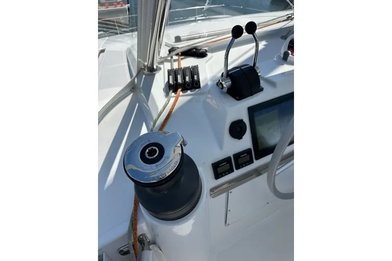Slide: The Image of Helm station of 2023 Bali 4.4 yacht with controls and navigation display. - 37