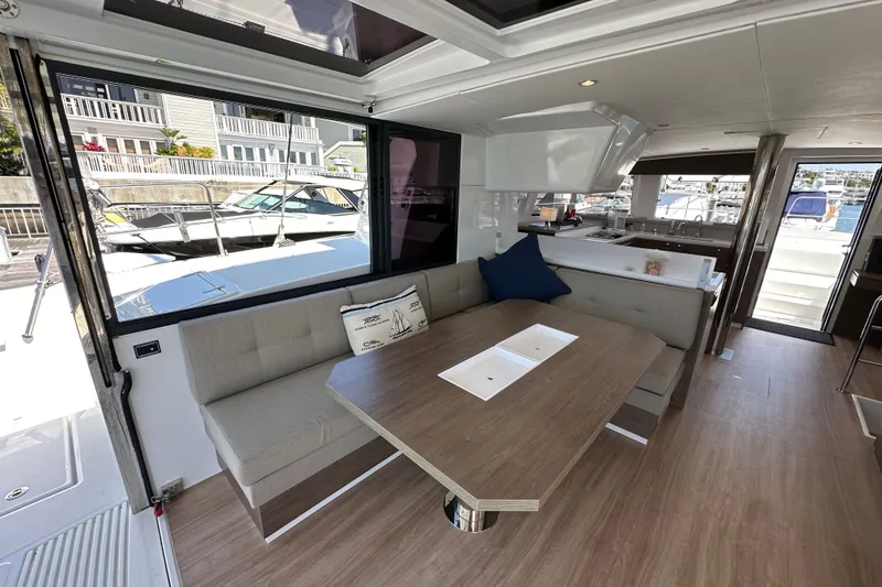 Slide: The Image of Interior of 2023 Bali 4.4 yacht with modern seating and dining area. - 53