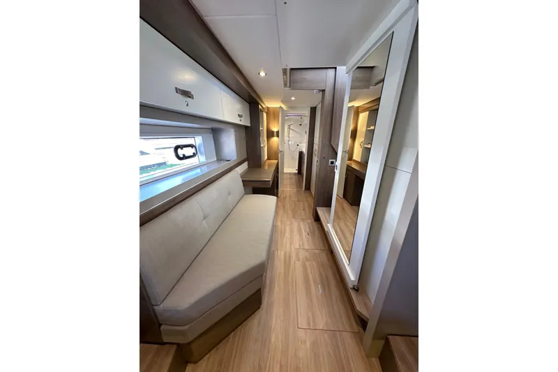Slide: The Image of Luxurious interior of 2023 Bali 4.4 yacht with modern furnishings and ample natural light. - 75