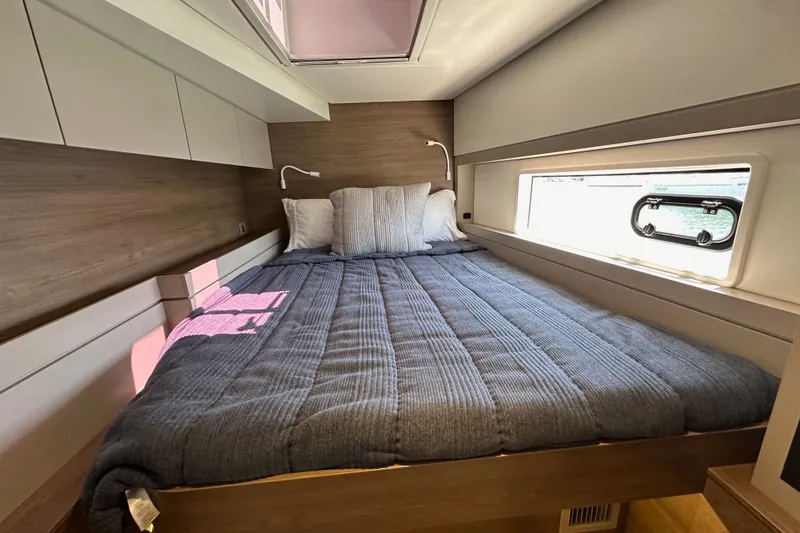 Slide: The Image of Cozy bedroom in 2023 Bali 4.4 yacht with modern design and natural light. - 91