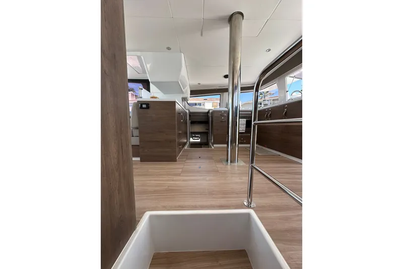 Slide: The Image of Interior of 2023 Bali 4.4 yacht, featuring modern wood flooring and sleek design elements. - 101