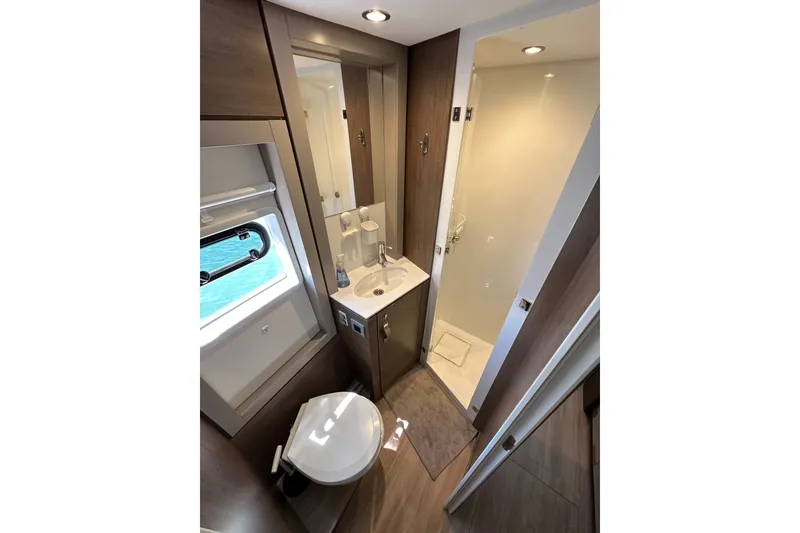 Slide: The Image of Modern bathroom in 2023 Bali 4.4 yacht with shower, sink, and toilet. - 94