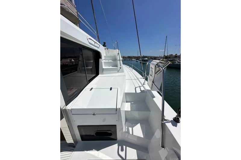 Slide: The Image of Modern 2023 Bali 4.4 yacht deck with sleek design and marina view. - 18