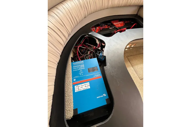 Slide: The Image of Electrical system inside a 1999 Maxum 4600 SCB boat, featuring wiring and components. - 8