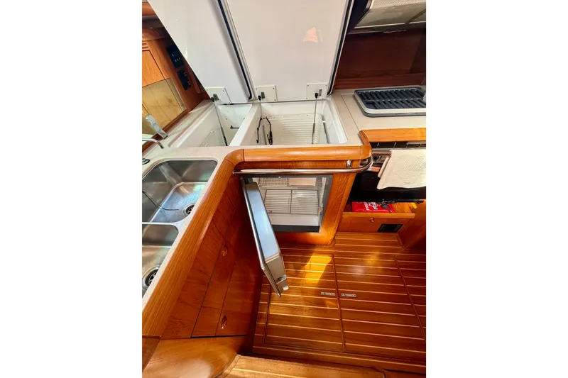 Slide: The Image of Interior view of 2008 Jeanneau Sun Odyssey 49 DS yacht kitchen area. - 61