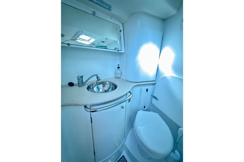Slide: The Image of Bathroom interior of 2008 Jeanneau Sun Odyssey 49 DS yacht, featuring sink and toilet. - 74