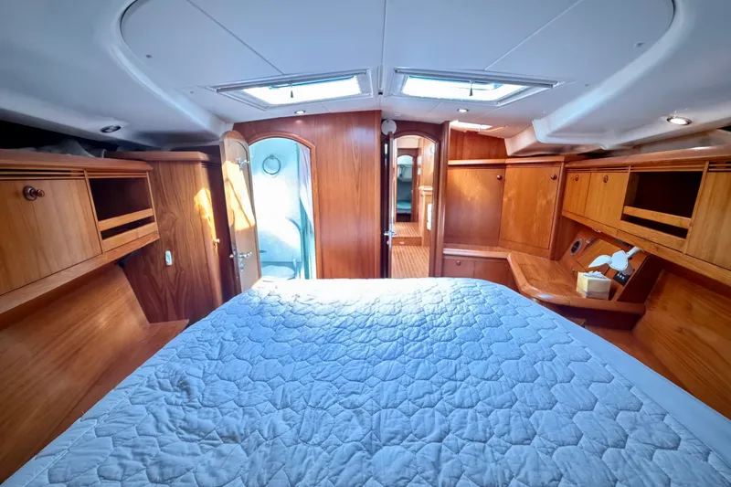 Slide: The Image of Luxurious cabin interior of 2008 Jeanneau Sun Odyssey 49 DS yacht with wooden finish. - 67