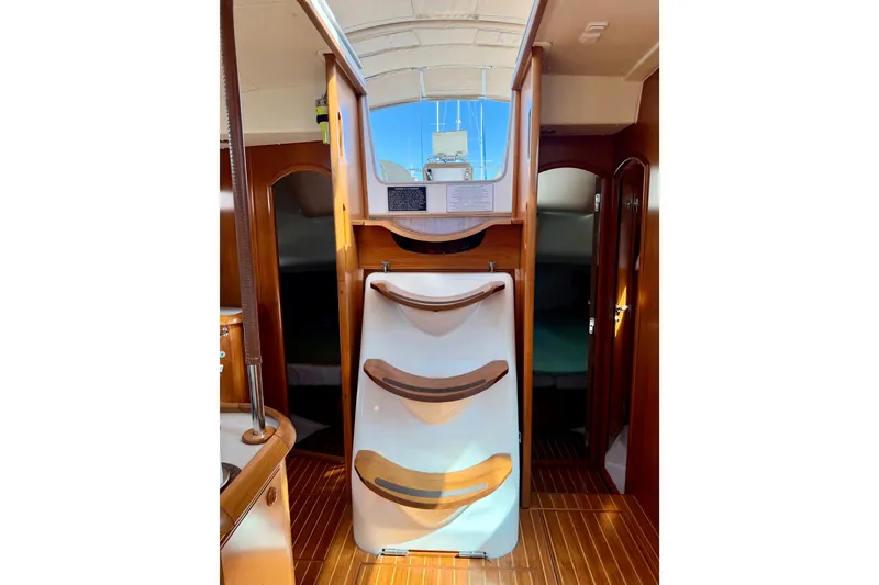 Slide: The Image of Interior of 2008 Jeanneau Sun Odyssey 49 DS sailboat with wooden flooring and stairs. - 54