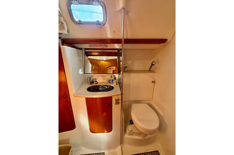Slide: The Image of Bathroom interior of 2008 Jeanneau Sun Odyssey 49 DS yacht, featuring sink and toilet. - 79