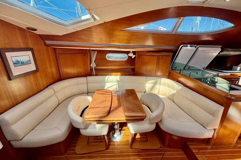 Slide: The Image of Luxurious interior of 2008 Jeanneau Sun Odyssey 49 DS sailboat with elegant seating and wood finish. - 49
