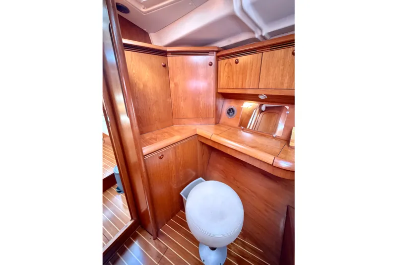 Slide: The Image of Luxurious wooden interior of 2008 Jeanneau Sun Odyssey 49 DS yacht cabin. - 70