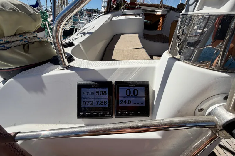 Slide: The Image of Cockpit of 2008 Jeanneau Sun Odyssey 49 DS with navigation instruments. - 34