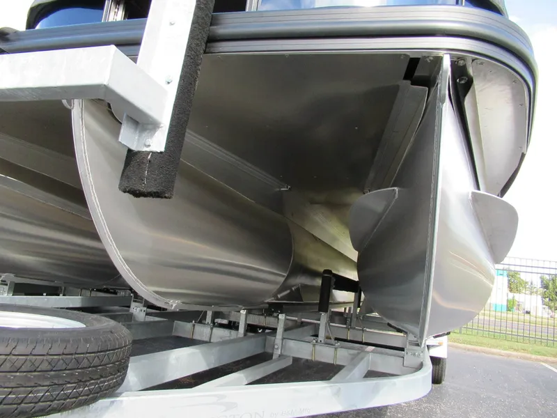Slide: The Image of Underside of a Bennington 22 MFB pontoon boat with aluminum hulls on a trailer. - 10
