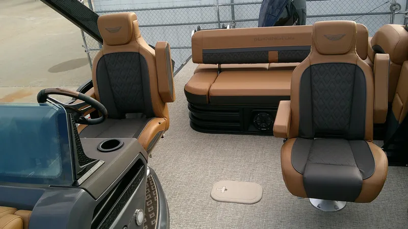 Slide: The Image of Luxurious interior of a Bennington M 26 boat with sleek seating and a modern helm. - 16