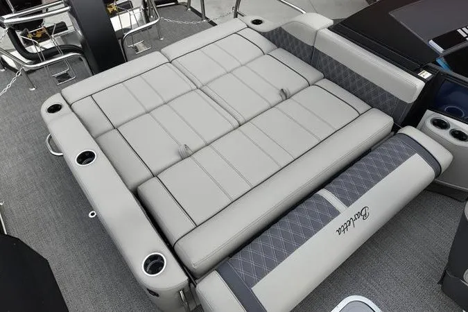 Slide: The Image of Luxurious seating on 2025 Barletta LUSSO 25UCAT pontoon boat, featuring elegant gray upholstery. - 18