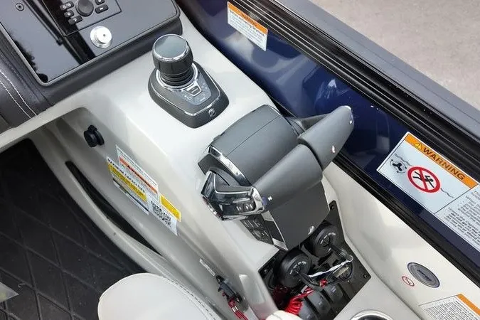 Slide: The Image of Control panel of 2025 Barletta LUSSO 25UCAT boat with joystick and throttle. - 13