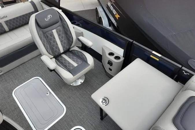 Slide: The Image of 2025 Barletta LUSSO 25UCAT boat interior with luxurious seating and modern design. - 15