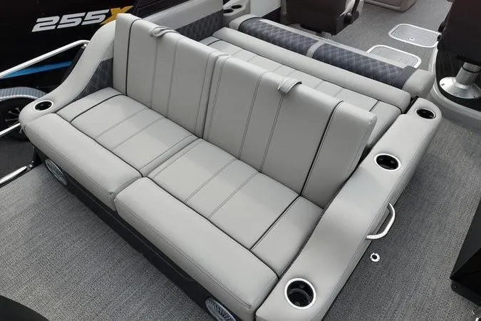 Slide: The Image of Luxurious seating on 2025 Barletta LUSSO 25UCAT pontoon boat with cup holders. - 20