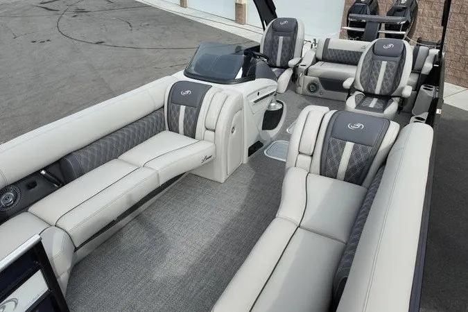 Slide: The Image of 2025 Barletta LUSSO 25UCAT luxury pontoon boat interior with plush seating. - 1
