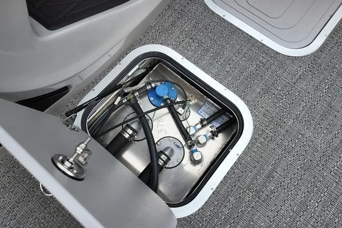 Slide: The Image of Access hatch of 2025 Barletta LUSSO 25UCAT showing internal components and wiring. - 7