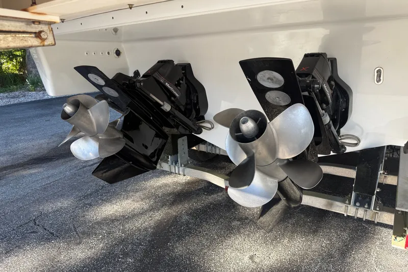 Slide: The Image of 2020 Formula 350 Crossover Bowrider boat propellers on a trailer. - 12