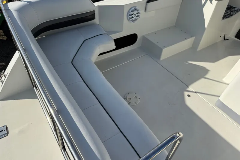 Slide: The Image of Spacious seating area on a 1991 Carver 25 Montego boat deck. - 6