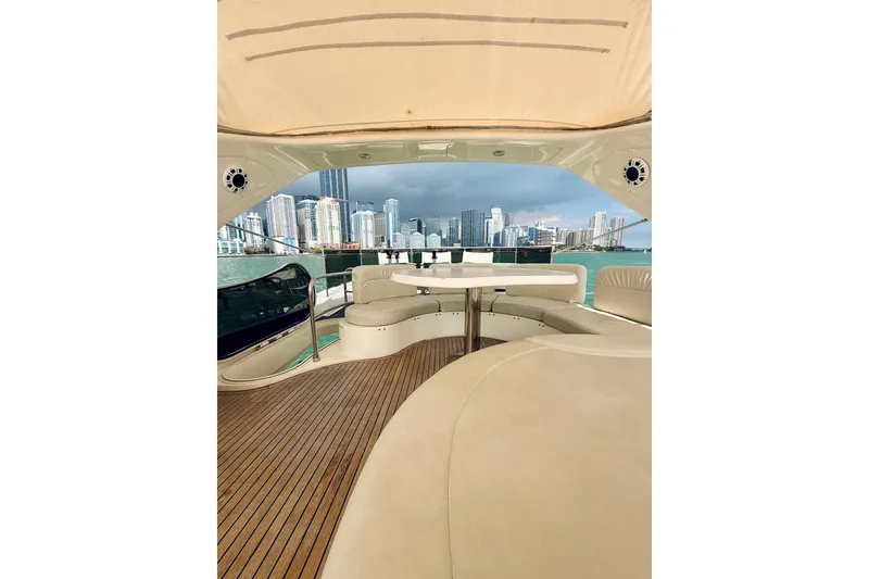 Slide: The Image of Luxurious 2007 Azimut 68E yacht interior with city skyline view. - 77