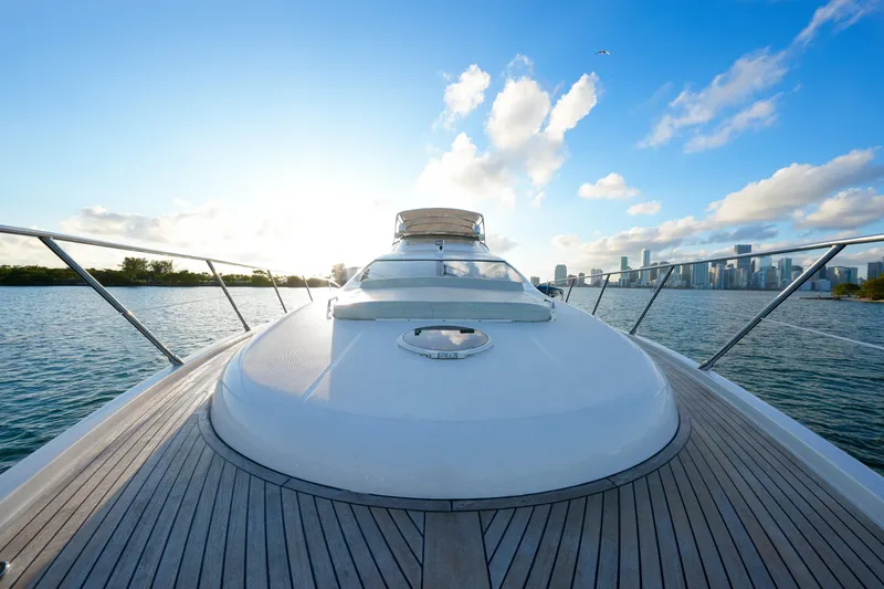 Slide: The Image of 2007 Azimut 68E yacht deck with city skyline and ocean view. - 72