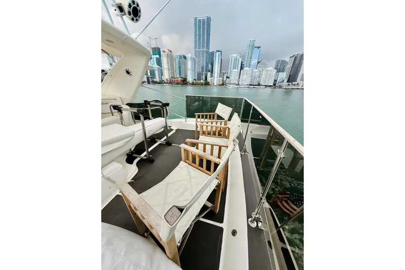Slide: The Image of Luxurious 2007 Azimut 68E yacht deck with city skyline view. - 83