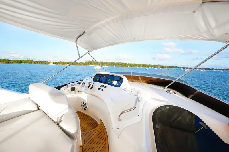 Slide: The Image of Luxurious 2007 Azimut 68E yacht interior with scenic ocean view. - 75