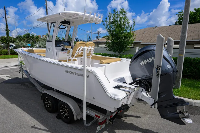 Slide: The Image of 2024 Sportsman Open 232 Center Console boat with Yamaha engine on trailer. - 10