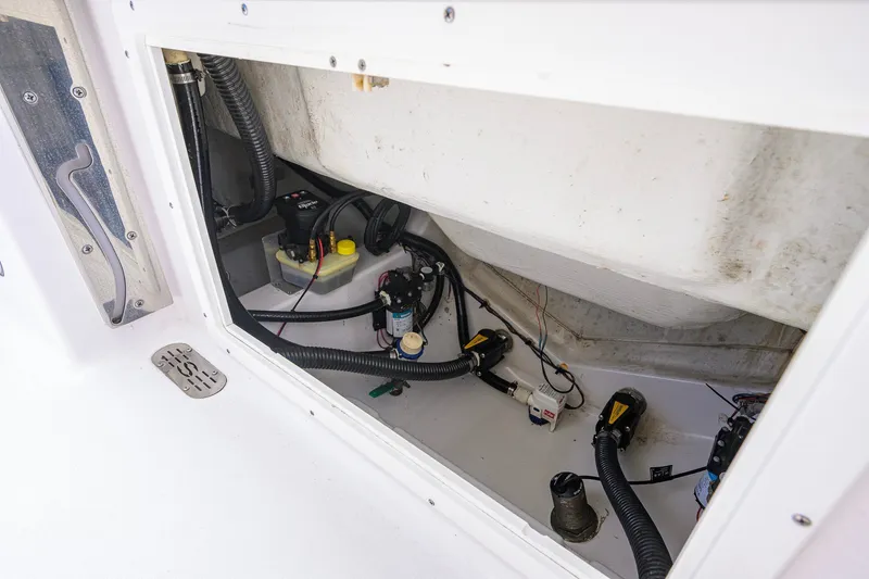 Slide: The Image of 2024 Sportsman Open 232 Center Console boat interior wiring and components. - 50