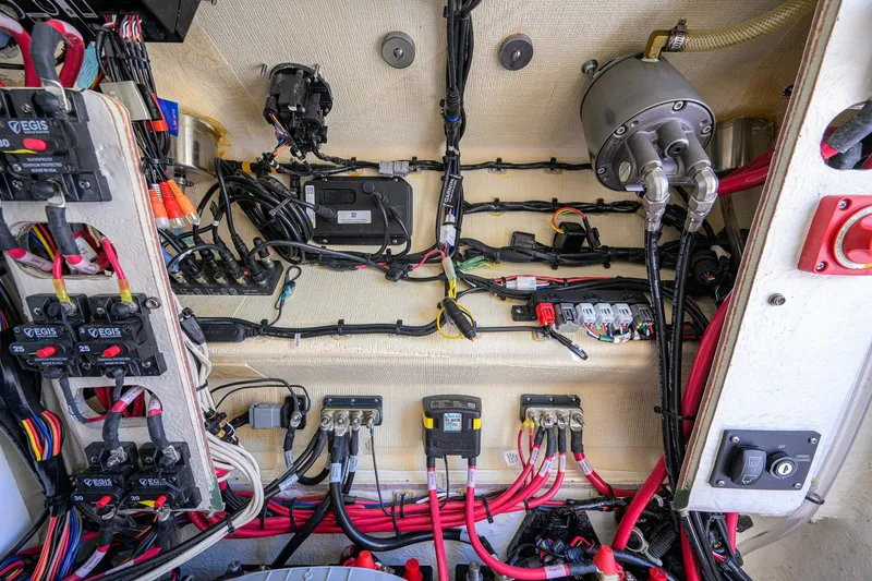 Slide: The Image of 2024 Sportsman Open 232 Center Console electrical wiring and components detail. - 56