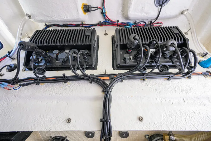 Slide: The Image of 2024 Sportsman Open 232 Center Console wiring and electronics setup. - 48