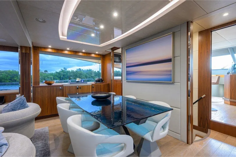 Slide: The Image of Luxurious interior of 2018 Sunseeker 86 Yacht with elegant dining area and scenic views. - 19