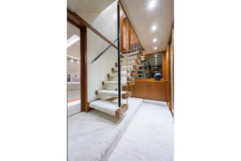 Slide: The Image of Luxurious interior of 2018 Sunseeker 86 Yacht with elegant staircase and modern design. - 54