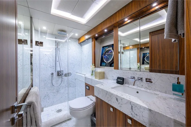 Slide: The Image of Luxurious bathroom on 2018 Sunseeker 86 Yacht with marble and wood finishes. - 53