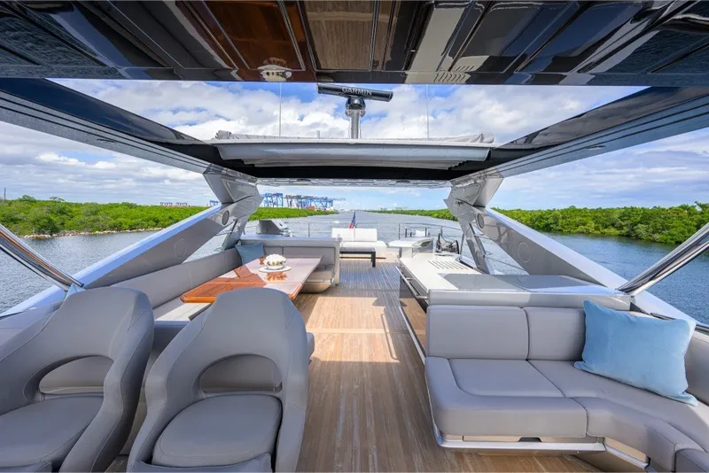 Slide: The Image of Luxurious 2018 Sunseeker 86 Yacht interior with elegant seating and scenic water views. - 68