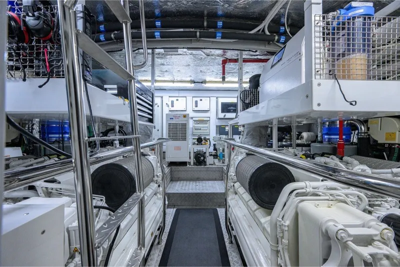Slide: The Image of Engine room of a 2018 Sunseeker 86 Yacht, showcasing advanced machinery and equipment. - 73
