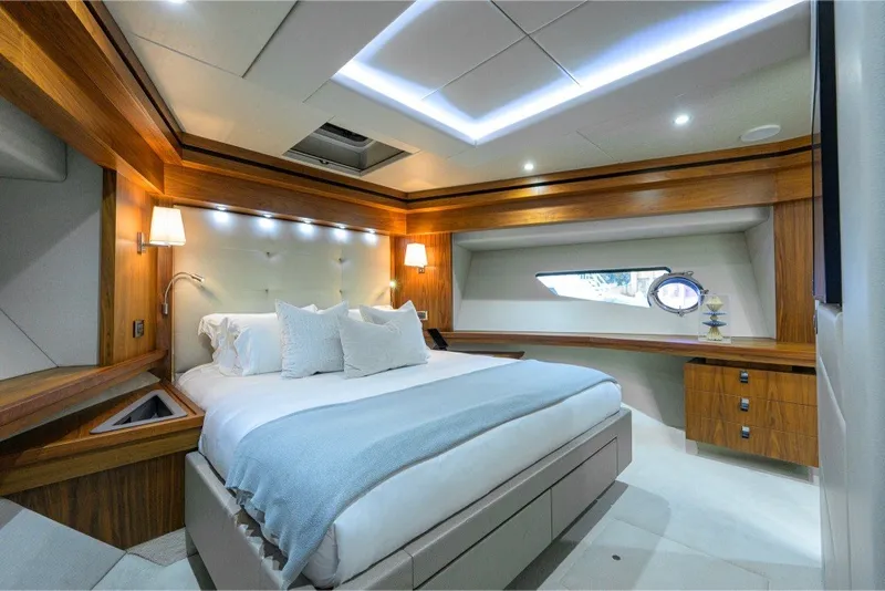 Slide: The Image of Luxurious bedroom interior of 2018 Sunseeker 86 Yacht with modern design and elegant wood finishes. - 41
