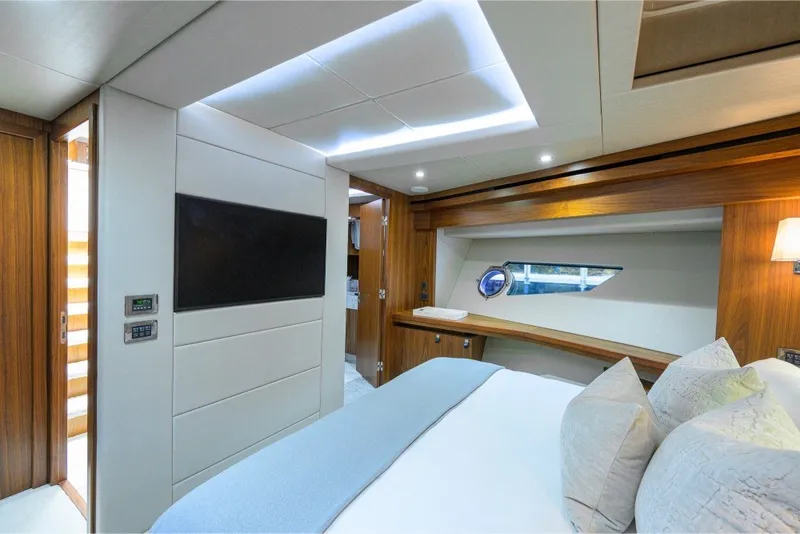 Slide: The Image of Luxurious bedroom interior of 2018 Sunseeker 86 Yacht with modern design and elegant furnishings. - 40