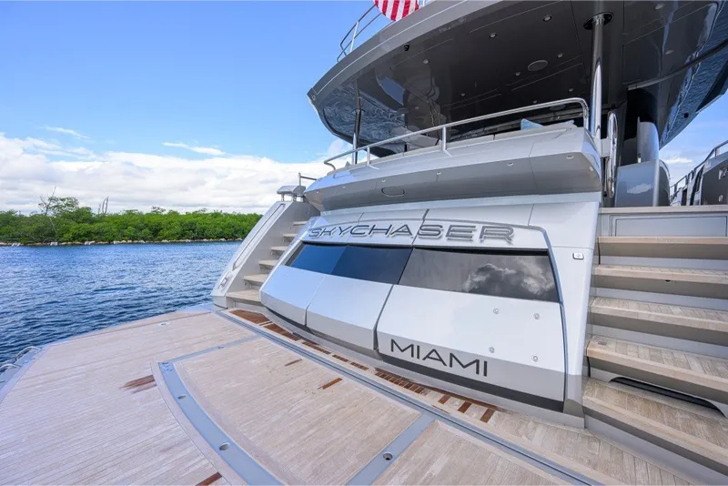Slide: The Image of 2018 Sunseeker 86 Yacht docked in Miami, featuring sleek design and luxury amenities. - 7