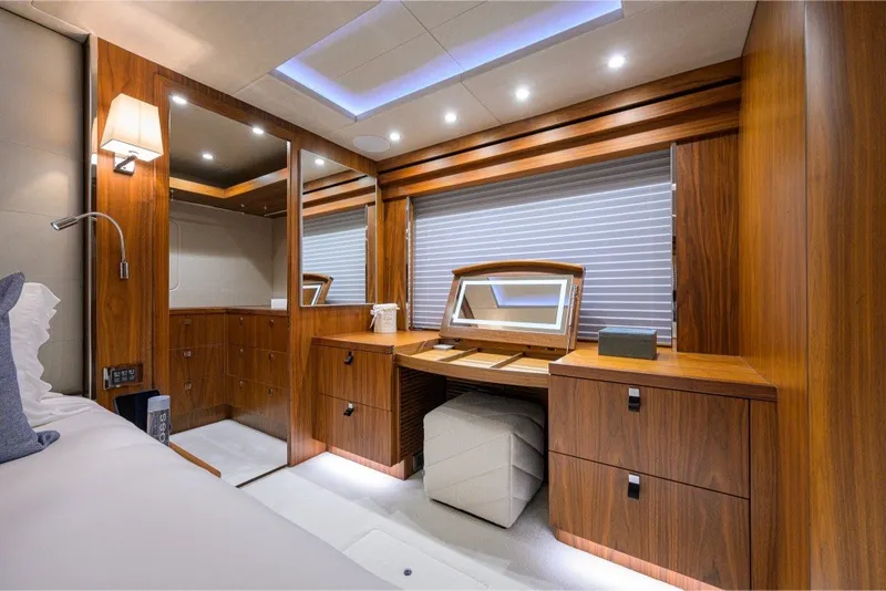 Slide: The Image of Luxurious interior of 2018 Sunseeker 86 Yacht with elegant wood furnishings and ambient lighting. - 33