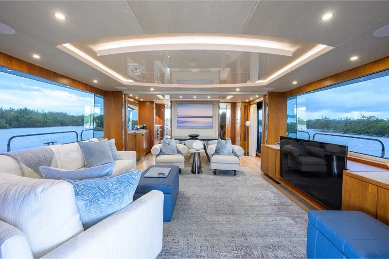 Slide: The Image of Luxurious interior of 2018 Sunseeker 86 Yacht with elegant furnishings and panoramic windows. - 16