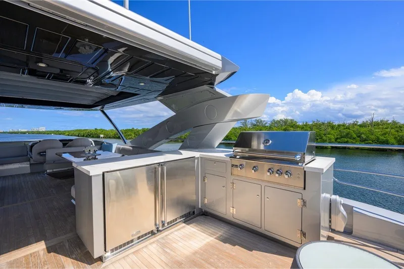 Slide: The Image of Luxurious outdoor kitchen on 2018 Sunseeker 86 Yacht with stainless steel appliances. - 62